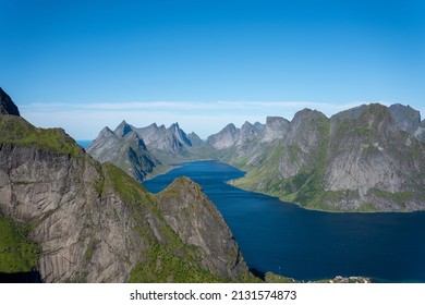 Photo of mountian ranges in Norway, Lofoten  Taken from top of mountian for a top down view of the water beneath