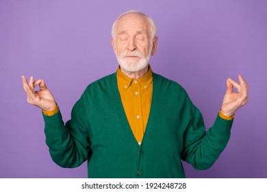 Photo of nice aged person closed eyes hands fingers meditate isolated on pastel violet color background - Powered by Shutterstock