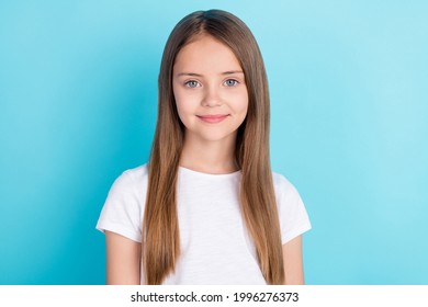 Photo Of Nice Brown Hair Small Girl Wear White T-shirt Isolated On Blue Color Background