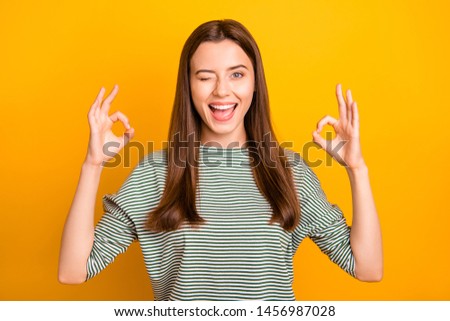 Photo of nice cute girl trying to become some prominent roman emperor and do several actions simultaneously while isolated with yellow background