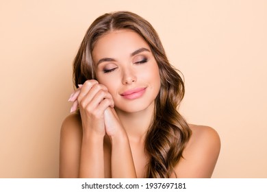 Photo Of Nice Long Hairdo Optimistic Lady Without Clothes Hands Face Isolated On Pastel Beige Color Background