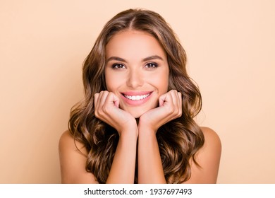 Photo of nice long hairdo optimistic lady without clothes hands face isolated on pastel beige color background