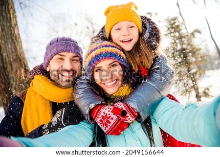 Photo of nice lovely family do selfie hug wear winter cloth outside walk in park