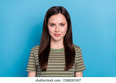 Photo of nice millennial brunette lady wear green t-shirt isolated on blue color background - Shutterstock ID 2188187437