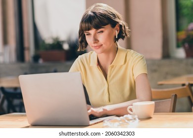 Photo Of Nice Young Brunette Lady Work Laptop Wear Yellow T-shirt Outside In Park