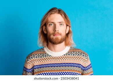 Photo of nice young man calm serious face wear pullover isolated on teal color background - Powered by Shutterstock