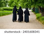 photo of nuns walking in the park