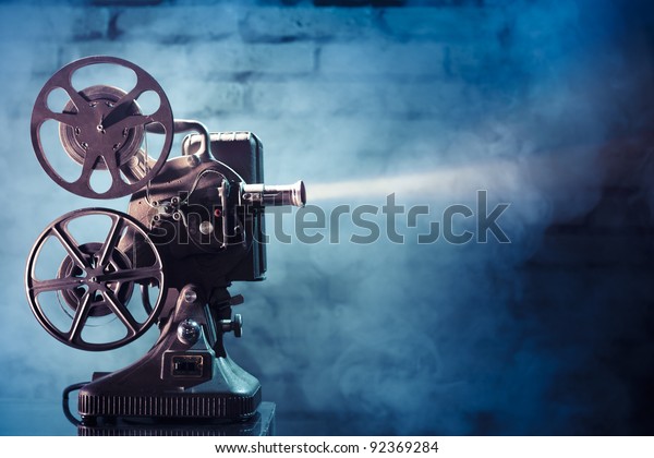 photo of an old movie\
projector
