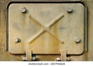 Photo Of Old And Rusty Military Vehicle Armored Surface Hatch Door Plate.