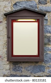 Photo Of An Old Weathered Illuminated Notice Board On A Wall, Plenty Of Copy Space To Add Your Own Text.