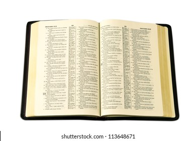 A Photo Of An Open Bible Isolated On A White Background.