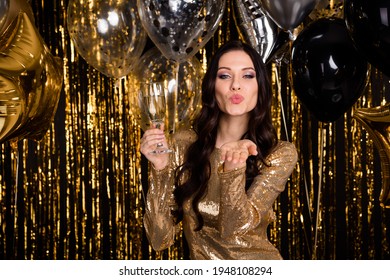 Photo of optimistic brunette curly hairdo lady with balloons glass wear nice dress isolated on gold color background