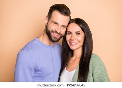 Photo Of Optimistic Brunette Nice Couple Wear Sweater Isolated On Beige Color Background