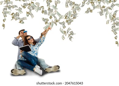 Photo Of Optimistic Nice Couple Win Money Isolated On White Color Background