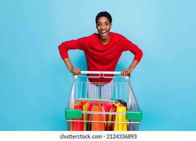 Photo of overjoyed screaming male see huge bargains rush to buy random stuff isolated on blue color background - Powered by Shutterstock