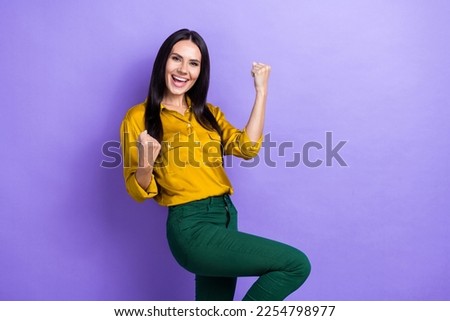 Photo of overjoyed successful lady trendy outfit rejoice scream hooray win jackpot lottery empty space isolated on purple color background