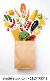 Photo Of Paper Bag With Vegetables, Fruits, Fish And Spaghetti