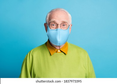 Photo Of Pensioner Grandpa Wear Blue Fabric Face Mask Green Pullover Isolated Blue Color Background