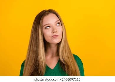 Photo of pensive minded person look empty space brainstorming decide isolated on yellow color background - Powered by Shutterstock