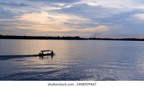 photo of people riding a boat on the river - Powered by Shutterstock