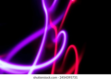 Photo picture abstract electric line neon purple colorful gradient black background. 
Concept three color red light trail slow shutter speed. - Powered by Shutterstock