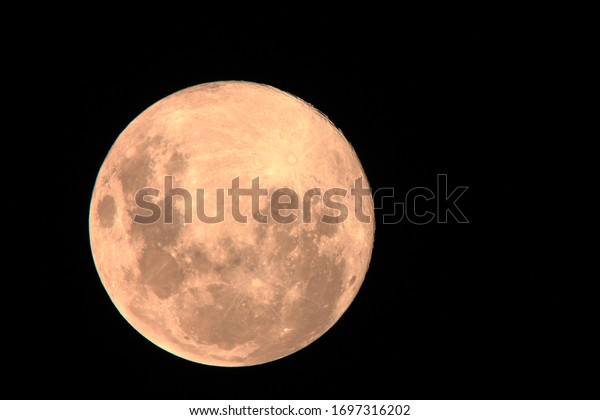 A photo of the pink moon of 7 April 2020 taken with\
1200mm zoom lens