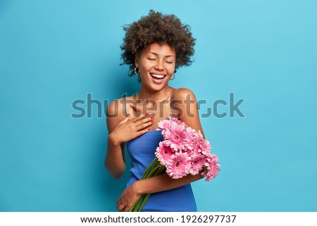 Similar – Image, Stock Photo An isolated blue flower in the green grass