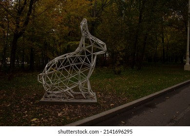 Photo of a polygonal sculpture of a rabbit in the VDNKh park in Moscow. Metal construction.
