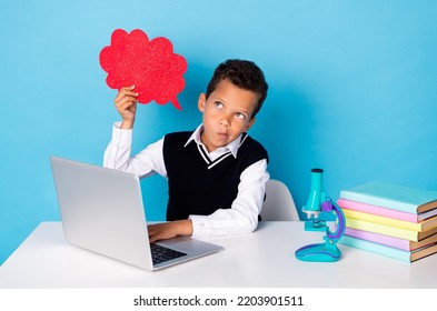 Photo Of Ponder Pensive Little Guy Dressed Black Vest Typing Modern Device Looking Empty Space Isolated Blue Color Background