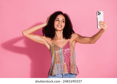 Photo portrait of attractive young woman take selfie photo dressed stylish sequins clothes isolated on pink color background - Powered by Shutterstock