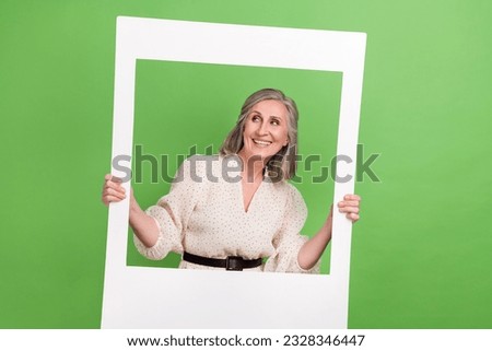 Photo portrait of beautiful grandma instant photo frame look empty space dressed stylish white garment isolated on green color background