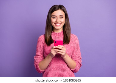 Photo Portrait Of Cheerful Nice Girl Typing Comment In Inernet Isolated On Vivid Violet Color Background