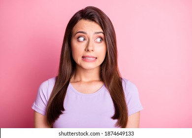 Photo Portrait Of Clumsy Girl Isolated On Pastel Pink Colored Background