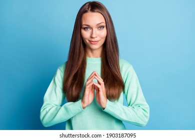 Photo Portrait Of Evil Genius Woman Scheming With Fingers Touching Isolated On Pastel Blue Colored Background