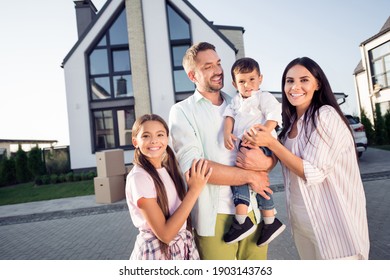 Photo Portrait Of Full Big Family Small Daughter Son Wife Husband Hugging Smiling Outside New Apartment In Summer