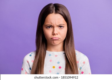 Photo Portrait Of Grumpy Kid Isolated On Vivid Violet Colored Background