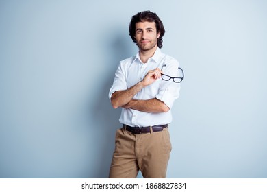 Photo Portrait Of Handsome Reliable Man Taking Off Glasses Isolated On Clear White Colored Background