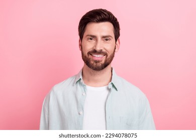 Photo portrait of handsome young guy toothy beaming smile face wear trendy blue outfit isolated on pink color background