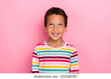 Photo portrait of little hispanic boy looking up empty space shopping promo wear stylish striped clothes isolated on pink color background - Shutterstock ID 2215287207