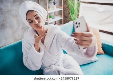 Photo portrait of lovely young lady selfie send air kiss head wrapped towel dressed bath robe beauty treatment personal care home concept - Powered by Shutterstock