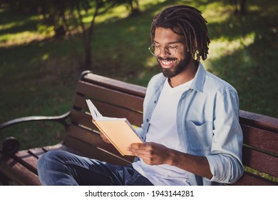 Photo Portrait Of Man In Glasses Smiling Sitting On Bench In Park Reading Book Spending Free Time