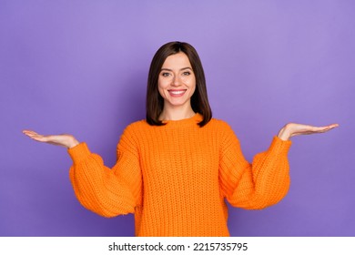 Photo portrait of nice young lady palms scales compare product dressed stylish knitted orange outfit isolated on purple color background - Shutterstock ID 2215735795