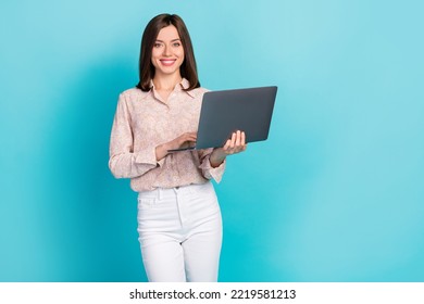 Photo portrait of nice young lady hold netbook online conference dressed stylish smart casual look isolated on aquamarine color background - Shutterstock ID 2219581213