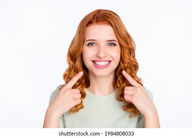 Photo portrait of red haired woman pointing fingers at smile white teeth isolated white color background