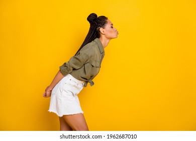 Photo Portrait Side View Of Girl Leaning In For A Kiss Isolated On Vivid Yellow Colored Background With Blank Space