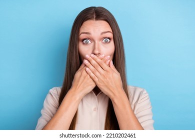 Photo Portrait Of Stunning Young Woman Hands Cover Mouth Astonished News Wear Stylish Smart Casual Look Isolated On Blue Color Background