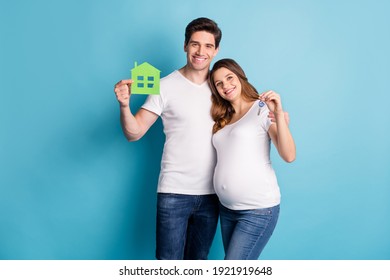 Photo Portrait Of Two People Happy Couple Holding Key From New Home Pregnant Wife Waiting Baby Isolated Vivid Blue Color Background