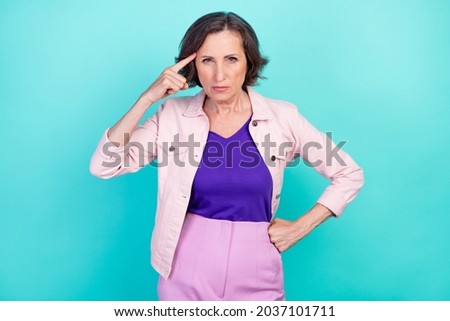 Photo portrait woman in casual clothes blaming showing bad attitude angry displeased isolated bright turquoise color background