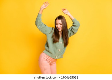 Photo portrait of woman dancing isolated on vivid yellow colored background
