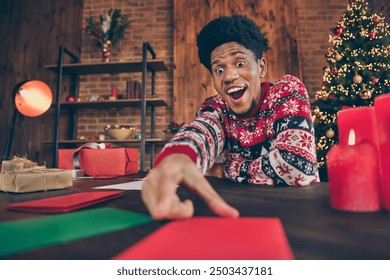 Photo portrait young man overjoyed writing letter to santa claus on xmas winter holidays wearing warm sweater - Powered by Shutterstock